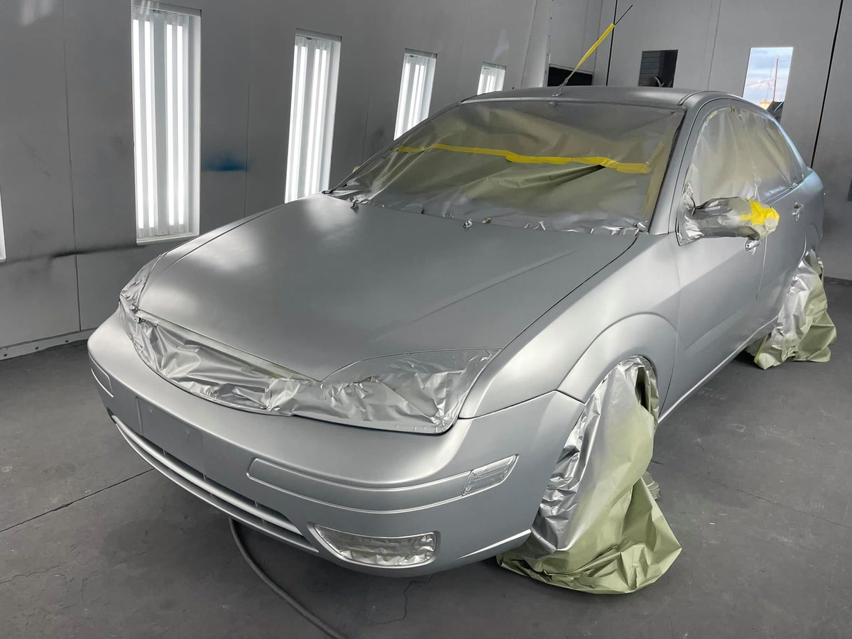 Auto paint preparation and masking on a vehicle at Superior Collision in Brownsville, TX