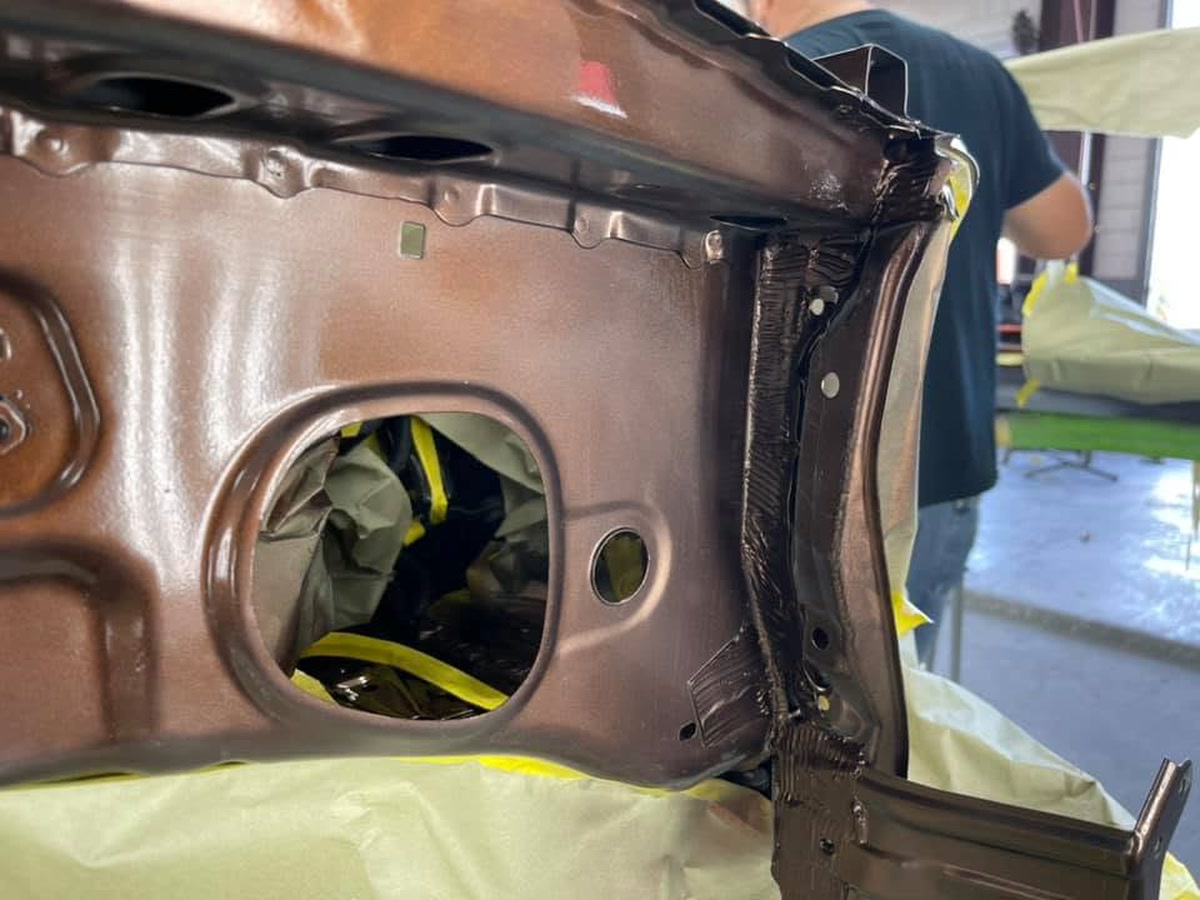 Vehicle unibody structure being inspected for straightening at Superior Collision in Brownsville, TX